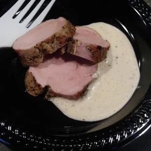 Central City BBQ&apos;s pork loin and Alabama white sauce