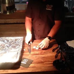 Central City BBQ slicing up some pork loin!