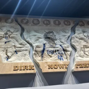 a close up of a wall with a plaque on it