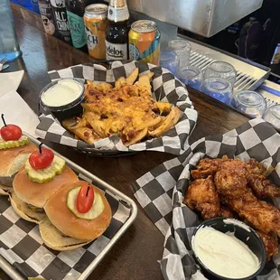 Sliders, loaded fries, kitchen sink boneless wings