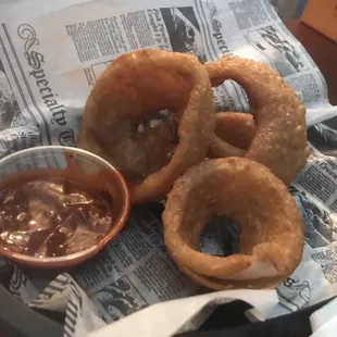 Huge onion rings, don&apos;t order this unless you have about three people to share it with!  We ate a few before I took this pic.