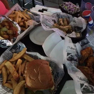 Po&apos; boy, blue burger, spicy garlic ranch wings, and Nox wings!