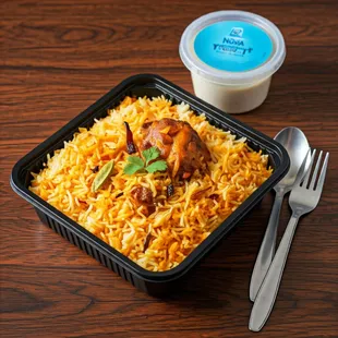 Aromatic and flavorful: The biryani is known for its rich, aromatic flavors that come from the combination of spices, chicken.