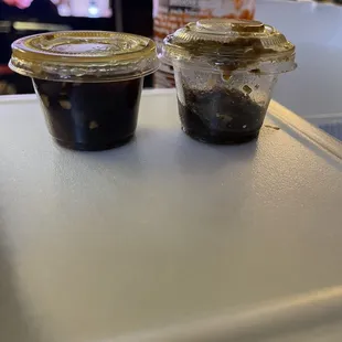 The extra sauce, the fresh one that we asked on the left and the one that has gas and is old/rotting