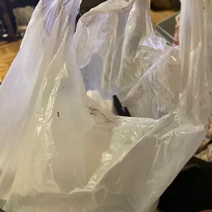 The bag was given full of grease and with black stained showing that it was used