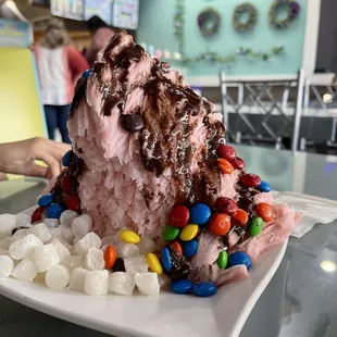 a large ice cream sundae with candy