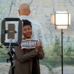Couple using our 360 photo booth.