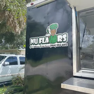 the logo on the side of a food truck