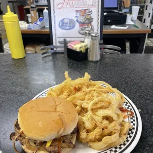 Jumbo cheeseburger with everything on it and onion rings. Fantabulous! Burger was so good I went back the next day for another!