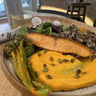 Carrot hummus, salmon, harissa broccoli and quinoa