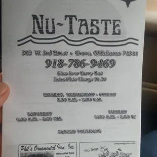 Their take out menu front with hours