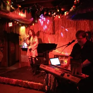 a man and a woman on stage