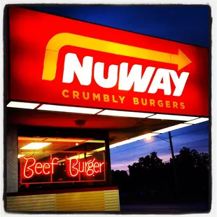 a neon sign for nu - way