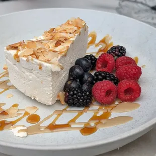 Halva cake with fresh berries. Barely sweet (sugar from dates), practically light as air. You can make room for it!