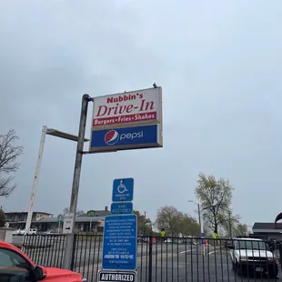 a sign for a drive - in