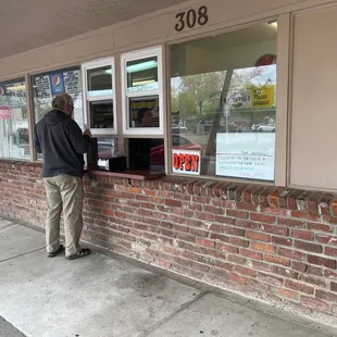a man standing at the counter