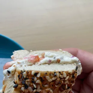 Spicy everything with red onion caper schmear and a tomato.