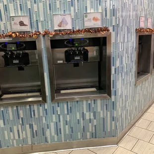 a row of ice cream machines