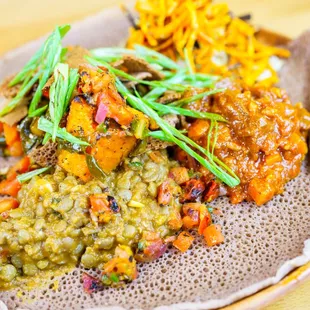 a plate of food on a wooden table