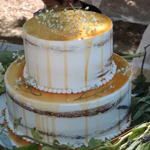 Tres leches with minimal frosting and dulce de le he drizzle