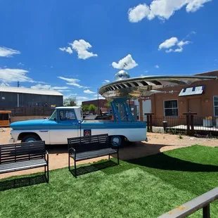 a truck parked in front of a building