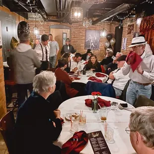 a group of people sitting around a table