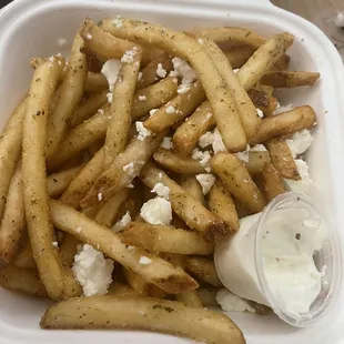 Greek Style Fries with Feta  don&apos;t get crazy with tzatziki smallest container ever for this. For $8.50 this is shameful.