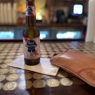 a bottle of beer on a table