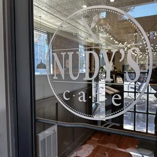 the entrance to nudy&apos;s cafe