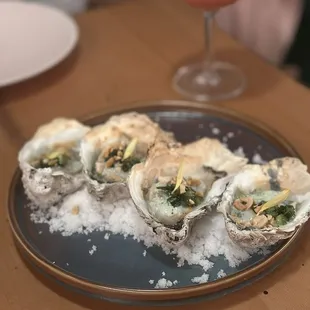 Grilled Oyster -- 5/5 flavor profile was good with the sauce and garnishes