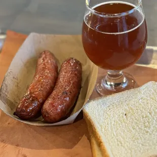 Jalapeño and cheese / garlic sausages with a June baby IPA