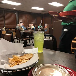 a man serving food in a restaurant
