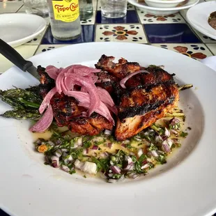 Pollo asado en achiote salpicon; grilled half chicken, habenero salsa and grilled asparagus