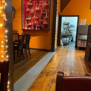 a dining room with a table and chairs