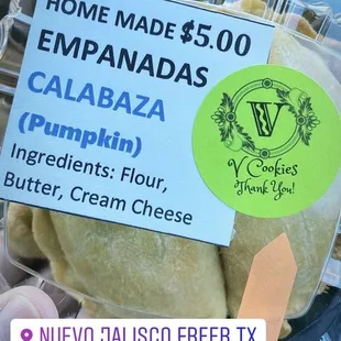 a person holding a container of food