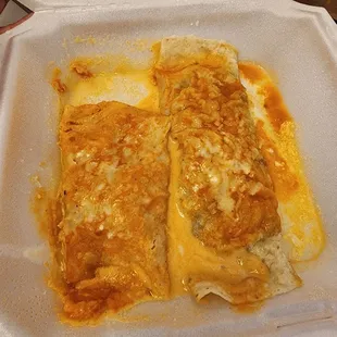 11. Beef Burrito (right), Taco (not pictured) and Enchilada (left). Poor presentation. The burrito is as flat as the enchilada.