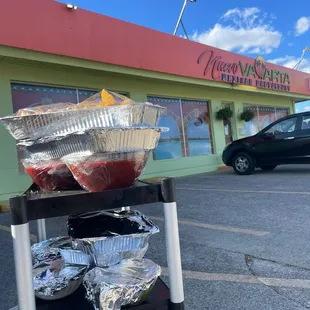 a cart of pies and pie pans