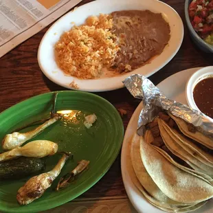 Carne Azada tacos w/corn tortillas, grilled onions &amp; pepper.