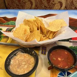 Chips with bean dip and salsa. Chicken burrito.