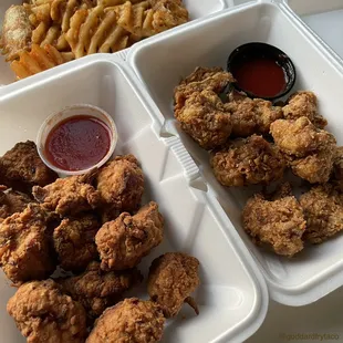Chicken Nuggets on the left, Vegan Nuggets (fried cauliflower) on the right, plus Waffle Fries &amp; tangy Sauces - YUM!!!