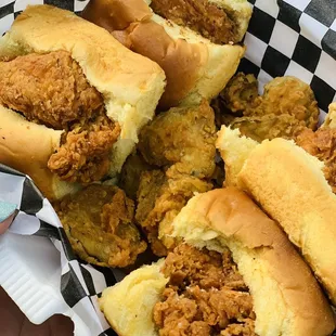 Chicken sliders on sweet rolls. Fried pickles.