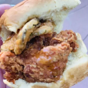 Nugg Slider with fried pickles and honey jalapeños