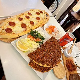 This place is something   Enjoying  #lahmacun and #kasarli sucuklu pide