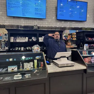 Manger throwing up gang signs horrible