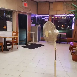 a fan in the middle of the room