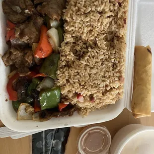 Beef and peppers lunch. Comes with fried rice, spring roll, egg Egg Drop Soup, fortune cookie.  Very tasty and very large portion!