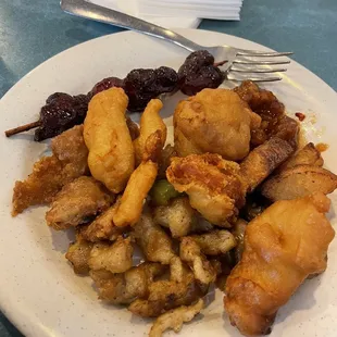 a plate of chinese food