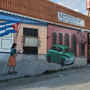 a woman holding a cuban flag