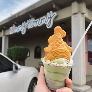 Taiyaki in a cup with a mix of matcha and black sesame