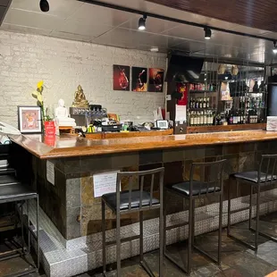 a bar with stools